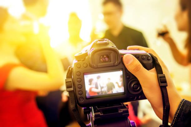 slr camera recording video at wedding party